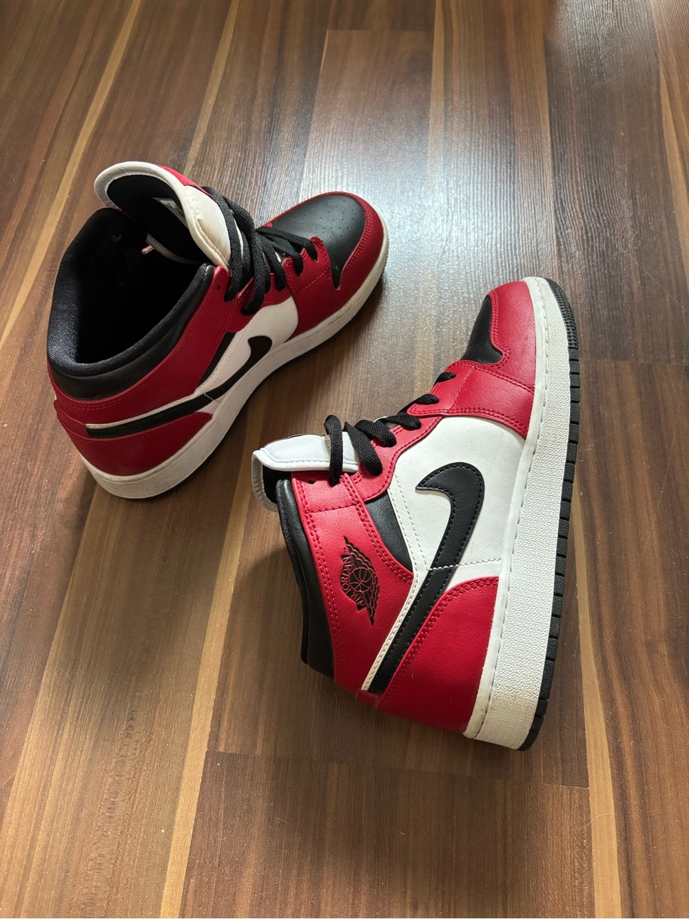 Nike Red White and Black Mid-Top Air Jordan 1 Sneakers